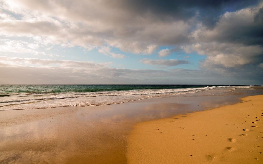 Sunrise in Fuerteventura Spain with ocean sounds for a background.