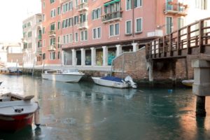 Boats on an icy Venetian canal