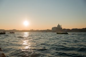 Sun rising over a frozen Venice Italy