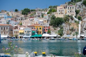 Colourful houses around the Symi Greece harbour